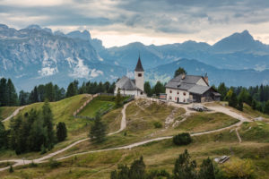 Heilig Kreuz Hospiz refuge and pilgrimage church at the foot of the Heiligkreuzkofel, in background Puez-Geisler Nature Park, Hochabtei / Alta Badia, Bolzano province, South Tyrol, Italy, Europe Heilig Kreuz Hospiz refuge and pilgrimage church at the foot of the Heiligkreuzkofel, in background Puez-Geisler Nature Park, Hochabtei / Alta Badia, Bolzano province, South Tyrol, Italy, Europe